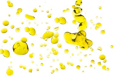 Olive Oil Drops Isolated on White clipart