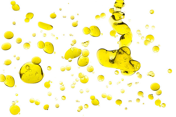 Olive Oil Drops Isolated on White