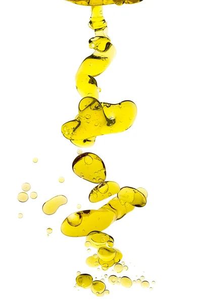 Капли оливкового масла, выделенные на белом — стоковое фото