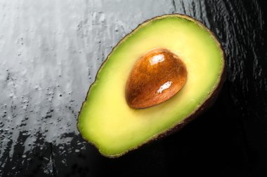 Top View of a Half Ripe Avocado. Clean Eating Concepts clipart