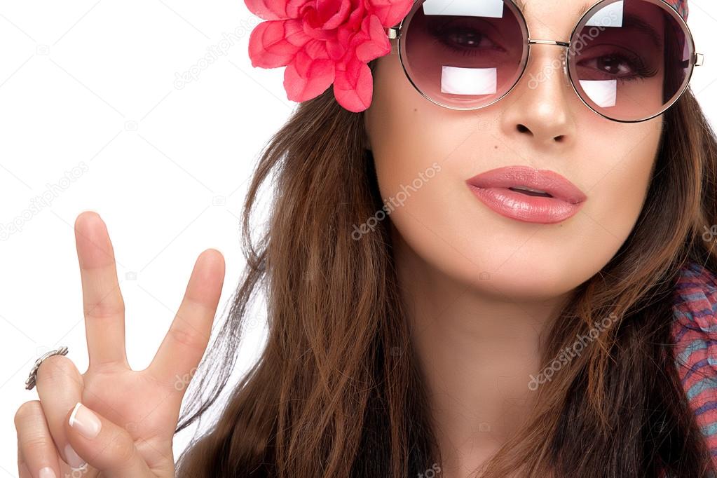 Pretty Fashionable Woman Showing Peace Hand Sign