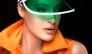 Gorgeous Woman in Green Sun Visor and Colorful Sportswear clipart