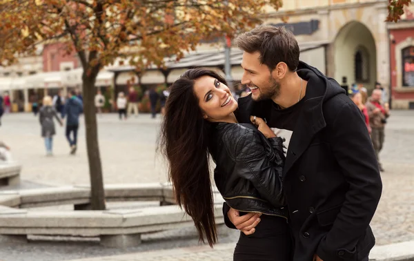 Autumn portrait of young couple — Stock Photo, Image