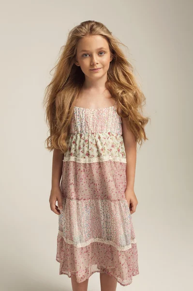 Longhair girl posing in studio — Stock Photo, Image