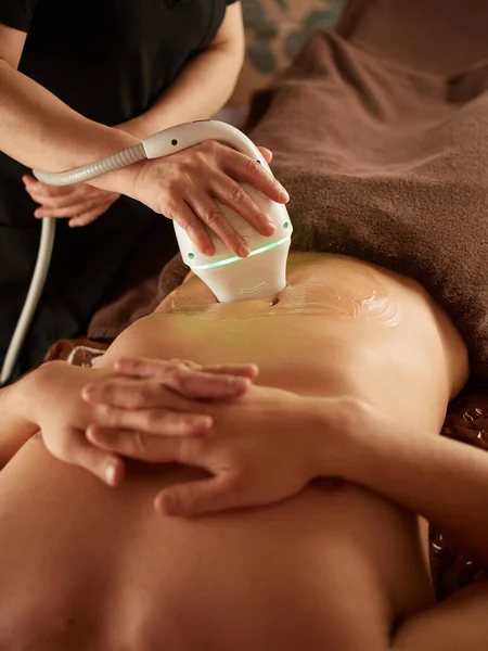 Asian Man Receiving Stomach Massage Machine — Stock Photo, Image