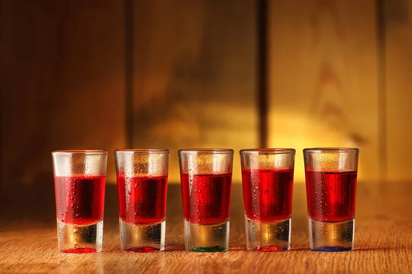 Five Glasses Cranberry Vodka Background Wooden Boards — Foto de Stock