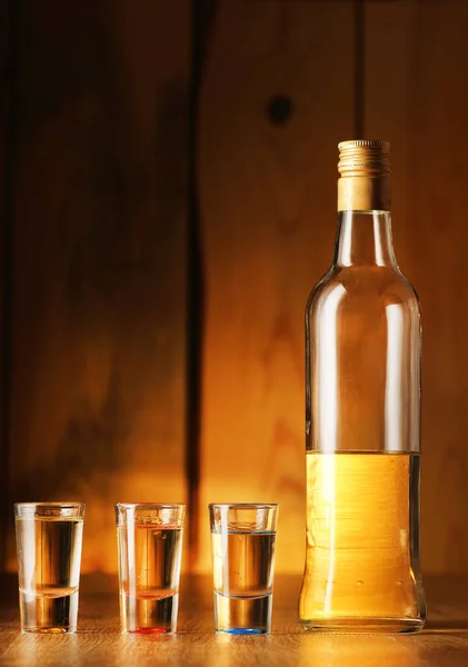 Rum Bottle Full Glasses Wooden Planks Background — Foto de Stock