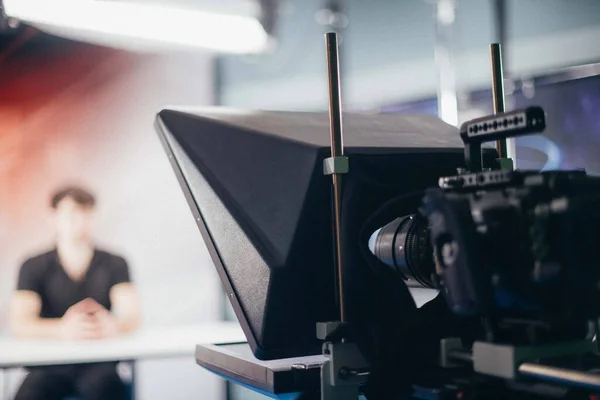 Professional film and video camera on the set. Shooting shift, equipment and group. Modern photography technique.