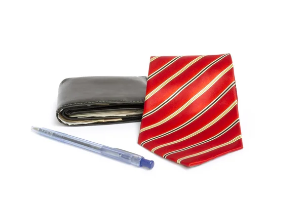 Cravatta rossa, portafoglio e penna a sfera — Foto Stock