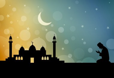 Müslüman adamın silueti dua ediyor. 