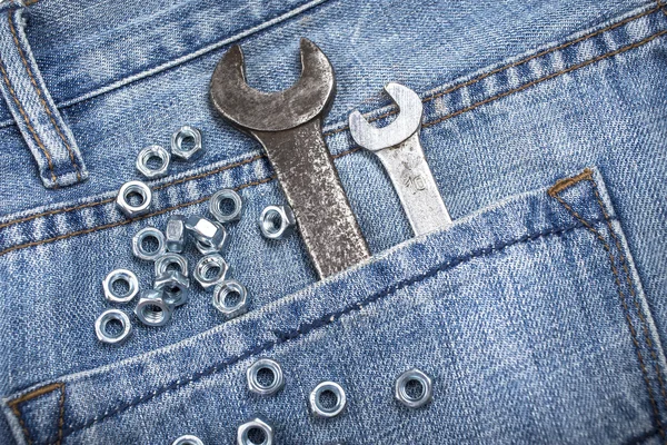 Wrench is in the back pocket — Stock Photo, Image