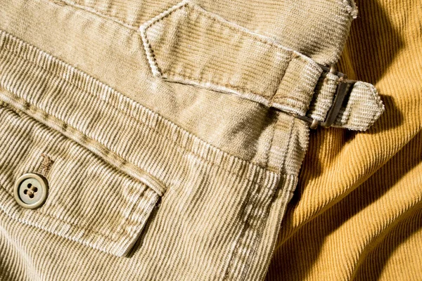 Corduroy skirt or trousers with a pocket, close-up. Copy space. — Stock Photo, Image