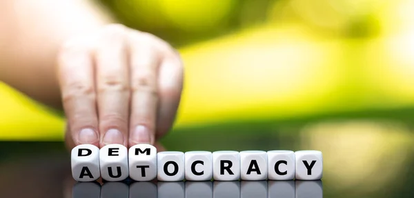 Hand Turns Dice Changes Word Autocracy Democracy — Stock Photo, Image