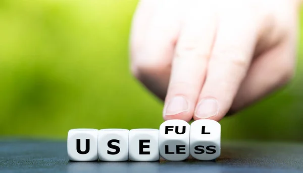 Hand Turns Dice Changes Word Useless Useful — Stock Photo, Image