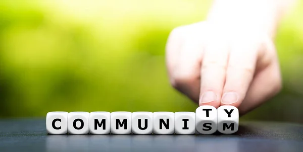 Hand Turns Dice Changes Word Communism Community — Stock Photo, Image