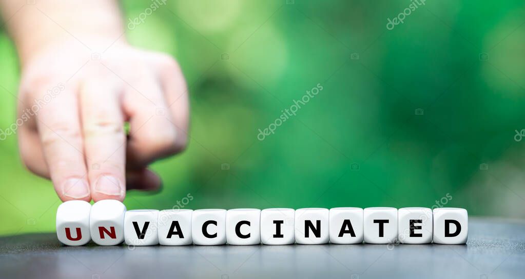 Symbol for getting vaccinated. Hand turns dice and changes the expression 