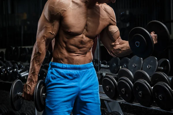 Man training with dumbbells — Stock Photo, Image