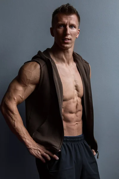 Muscular man wearing vest — Stock Image Muscular man wearing vest Royalty Free Stock Images