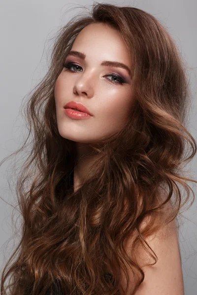 Woman with long curly hair — Stock Photo, Image