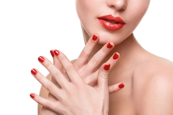 Kobiece czerwone usta i paznokcie — Zdjęcie stockowe