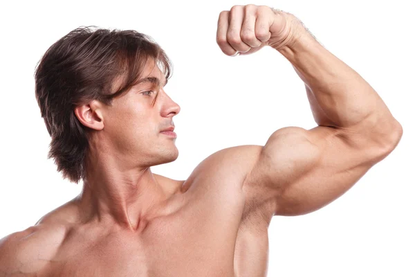 Hombre musculoso con bíceps — Foto de Stock