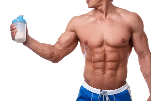 Muscular man with protein drink — Stock Photo, Image