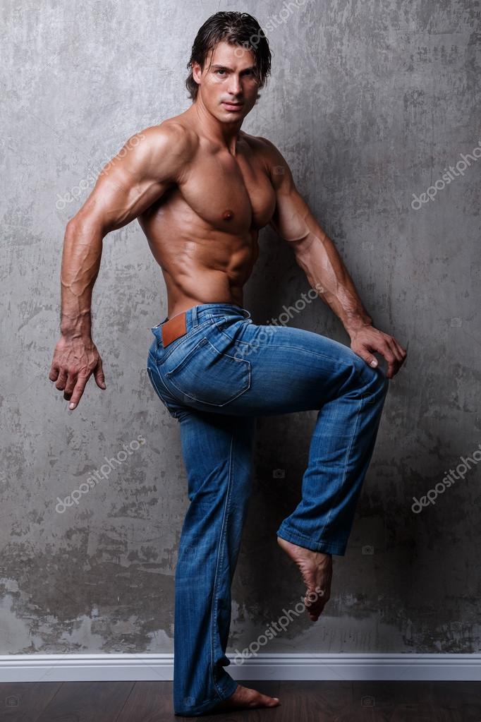 muscular men in jeans