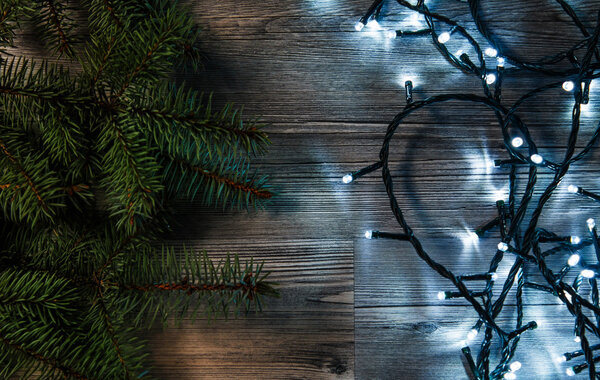 Christmas lights and branches of spruce