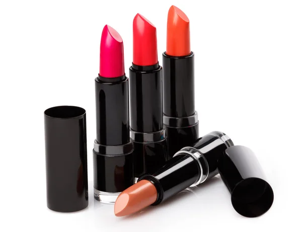 Diferentes lápices labiales aislados — Foto de Stock