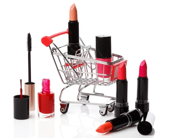 Shopping trolley with make-up products — Stock Photo, Image