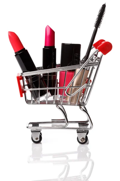 Bevásárló kocsi, make-up termékek — Stock Fotó