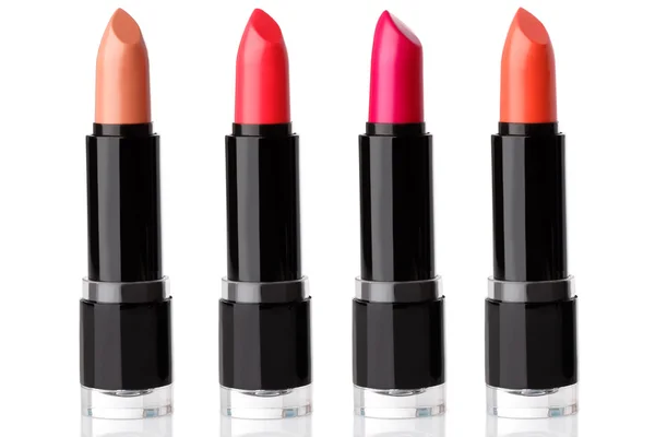 Diferentes lápices labiales aislados — Foto de Stock