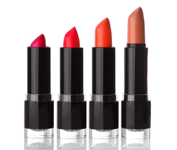 Diferentes lápices labiales aislados — Foto de Stock