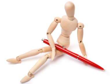 Küçük tahta kukla ve tükenmez kalem