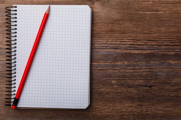 Notepad on wooden surface