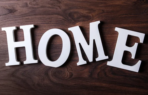 Letras blancas con palabra HOME — Foto de Stock