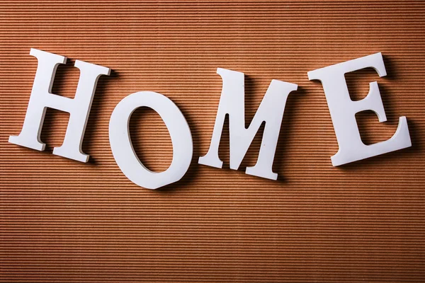 Letras blancas con palabra HOME — Foto de Stock