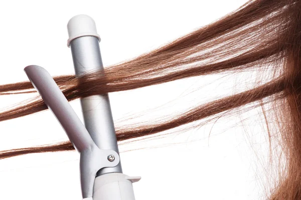 Ferro arricciacapelli e capelli — Foto Stock