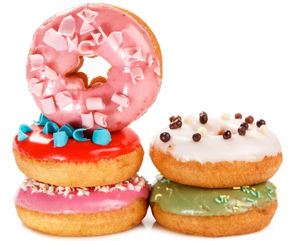 Donuts coloridos no fundo — Fotografia de Stock