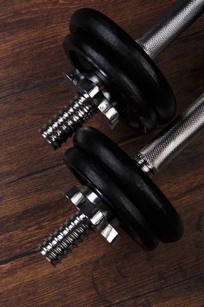 Black dumbbells on   floor — Stock Photo, Image