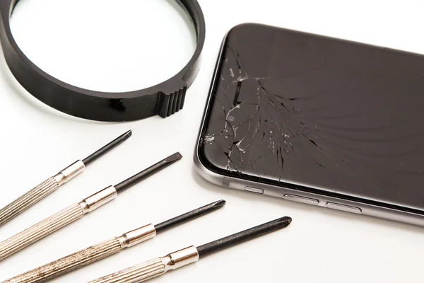 Smart phone and tools for repair — Stock Photo, Image