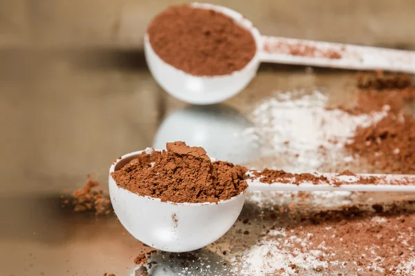 Scoops with protein powder — Stock Photo, Image
