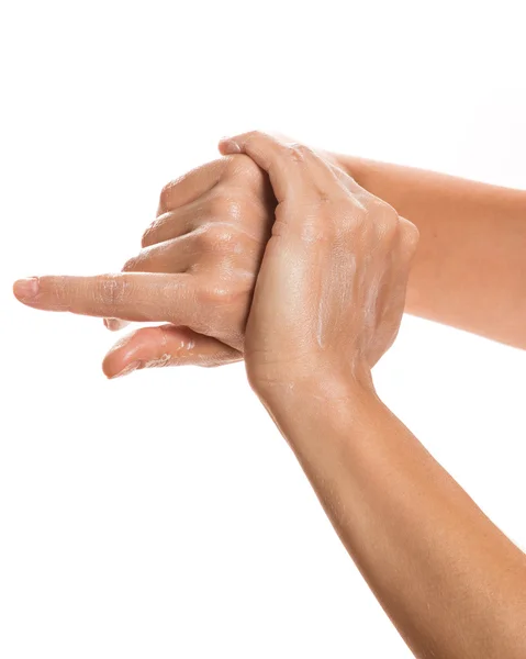 Ženské ruce a hydratační krém — Stock fotografie