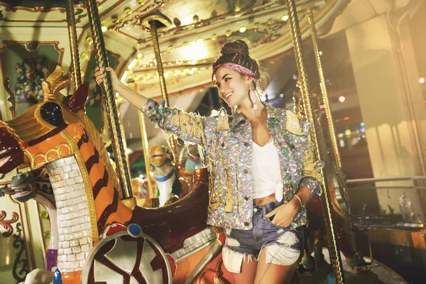 Stylish Woman Wearing Sparkling Jacket Carousel Theme Park — Stock Photo, Image