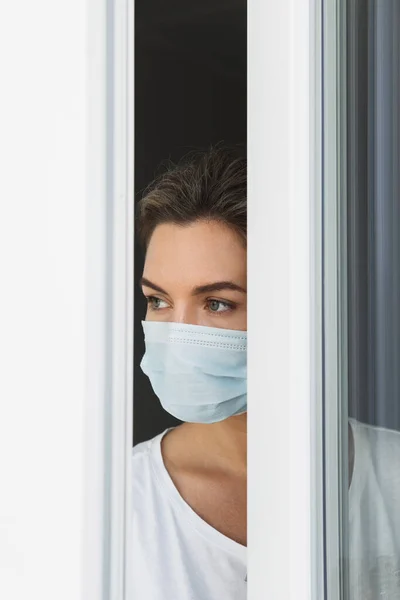 Young Scared Woman Wearing Prevention Mask Looking Window — Stock Photo, Image