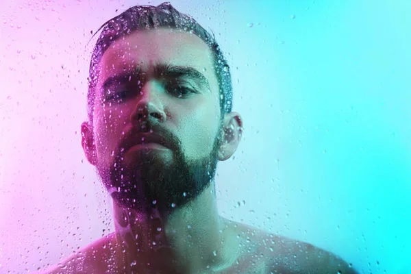 Portrait Handsome Young Man Wet Glass Neon Light — Stock Photo, Image