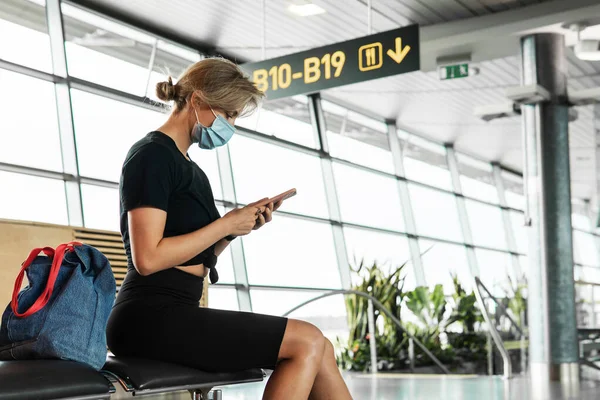 Young Woman Traveler Wearing Prevention Mask Airport Flight Awaiting — Stock Photo, Image