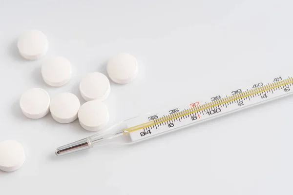 Close Thermometer White Pills — Stock Photo, Image