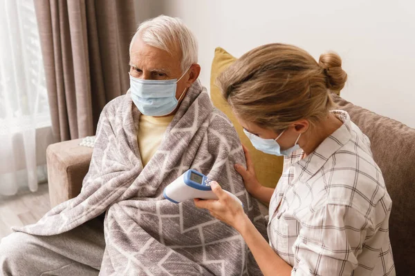 Young Woman Taking Care Her Elderly Grandfather Cold Syptoms Home — Stock Photo, Image