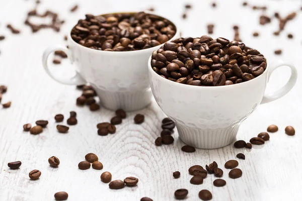 Cup and coffee beans — Stock Photo, Image